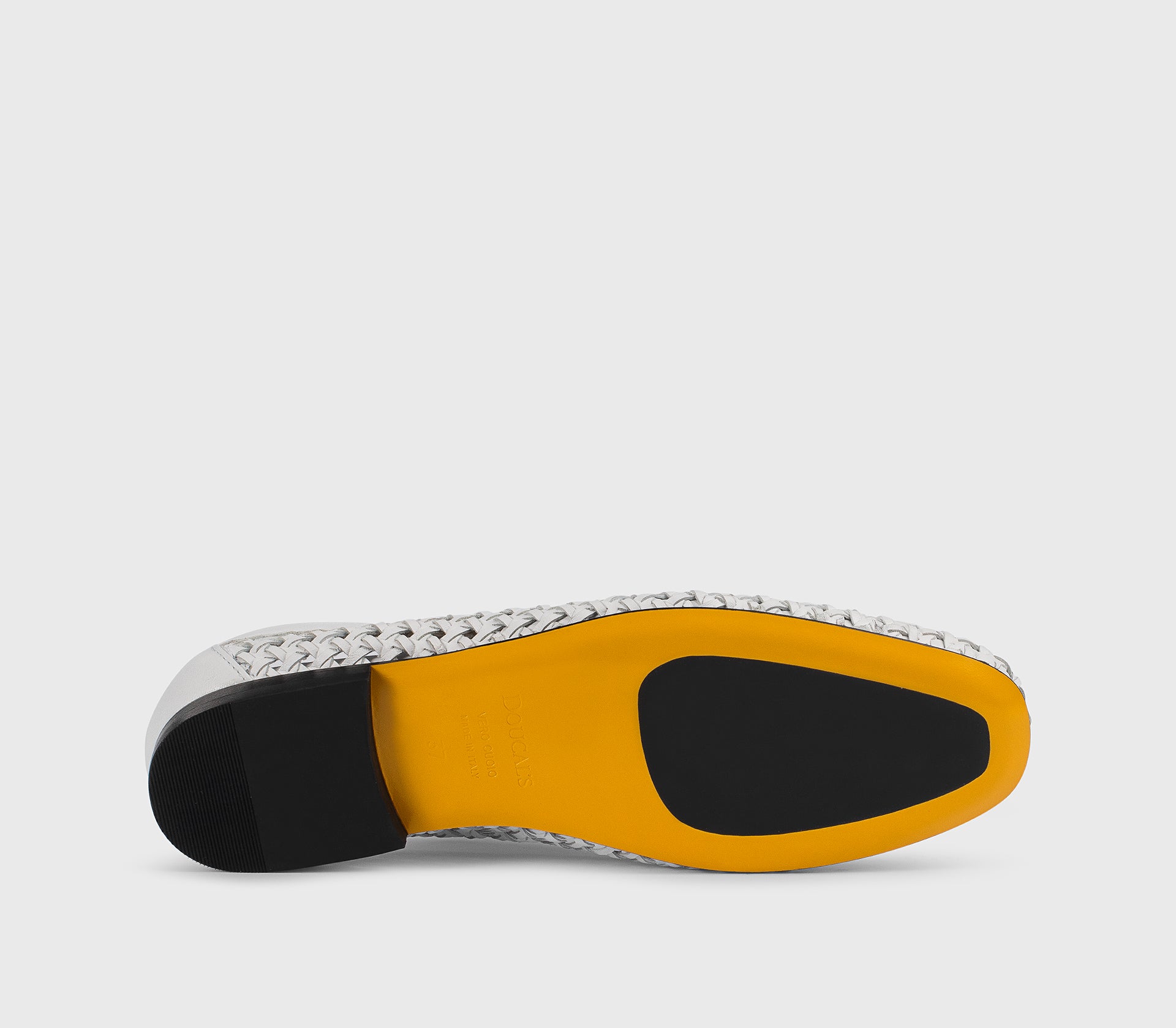 Loafer in white perforated leather