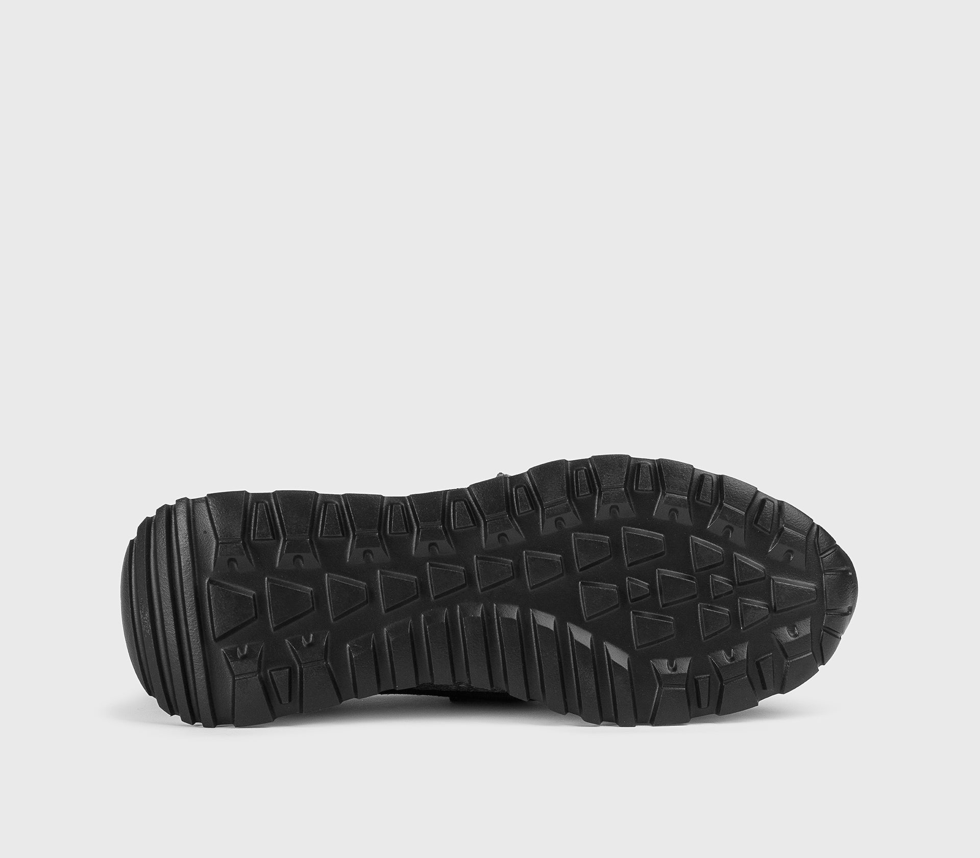 Brown and grey sneaker made from a combination of materials