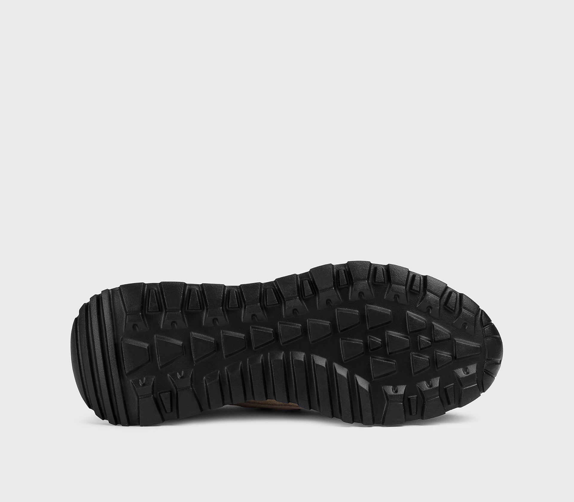 Beige sneaker made from a combination of materials