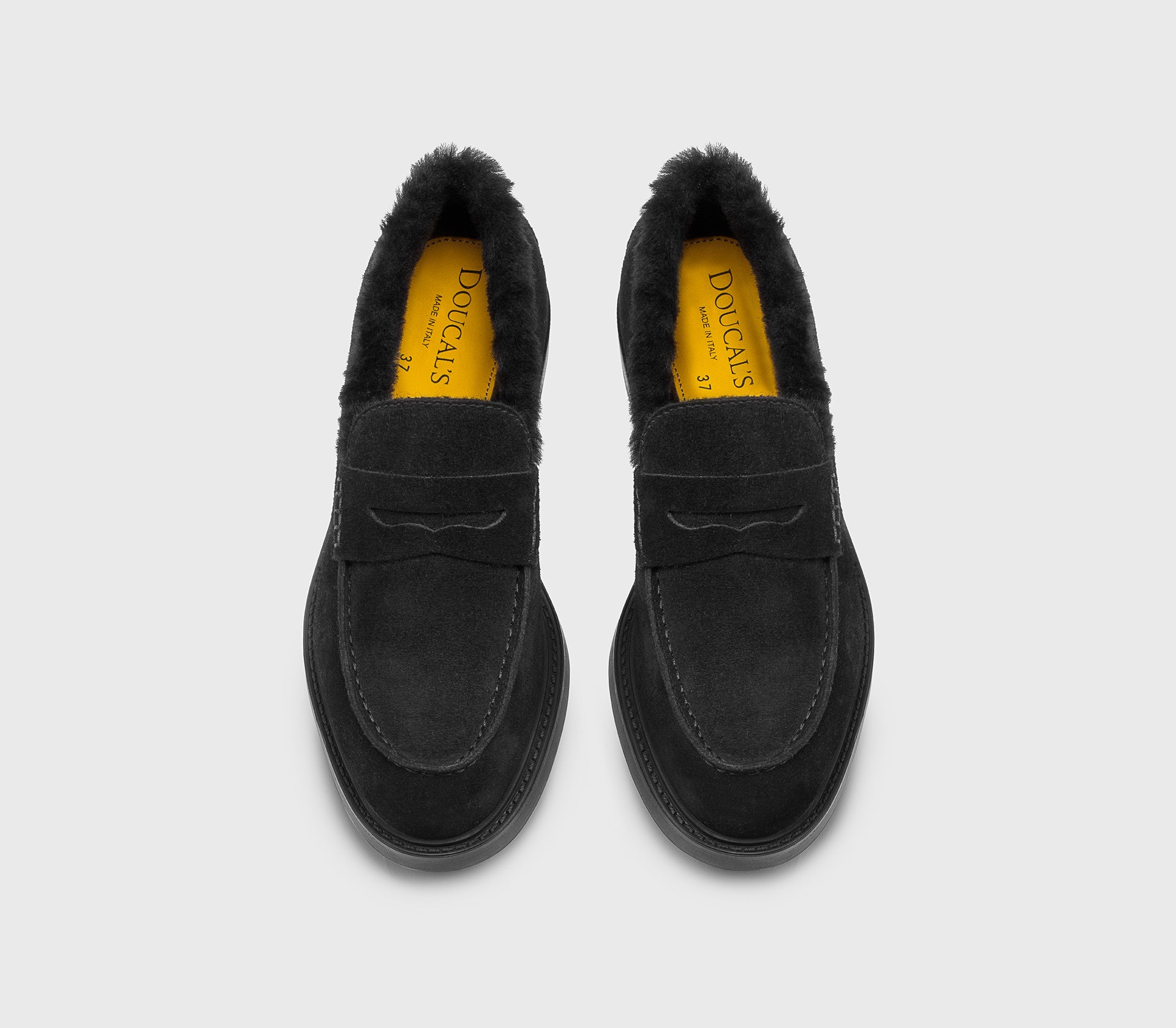 Black suede loafer with fur detail