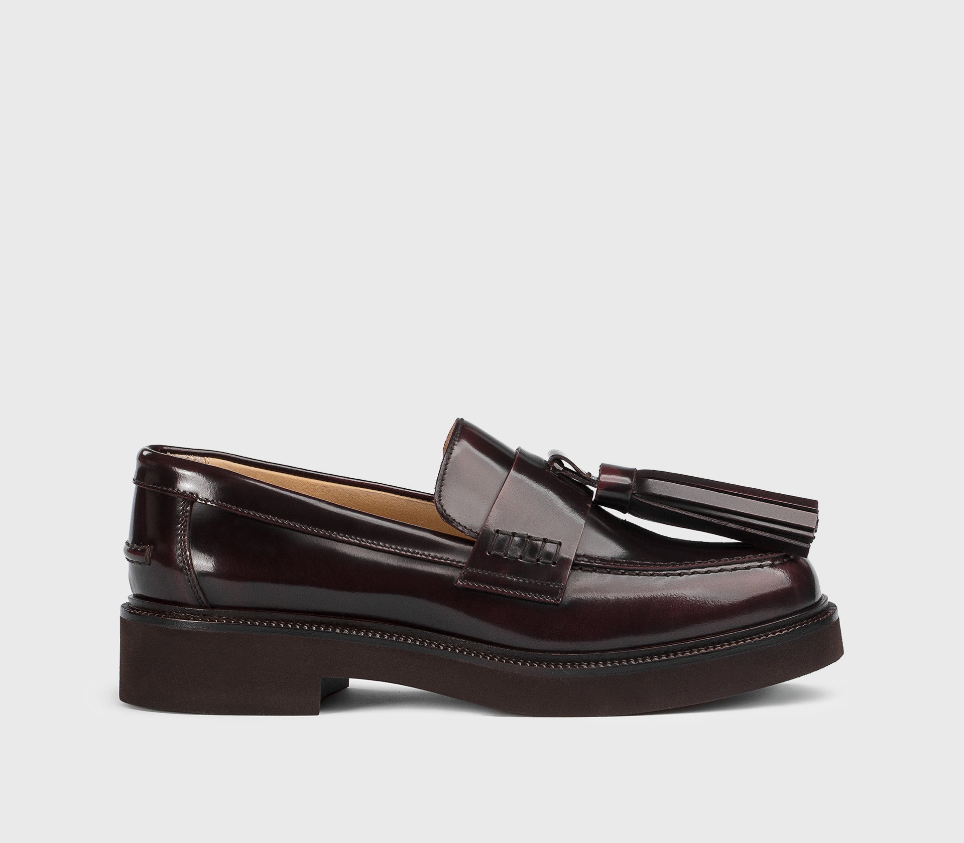 Mocassin avec maxi pompon en cuir bordeaux
