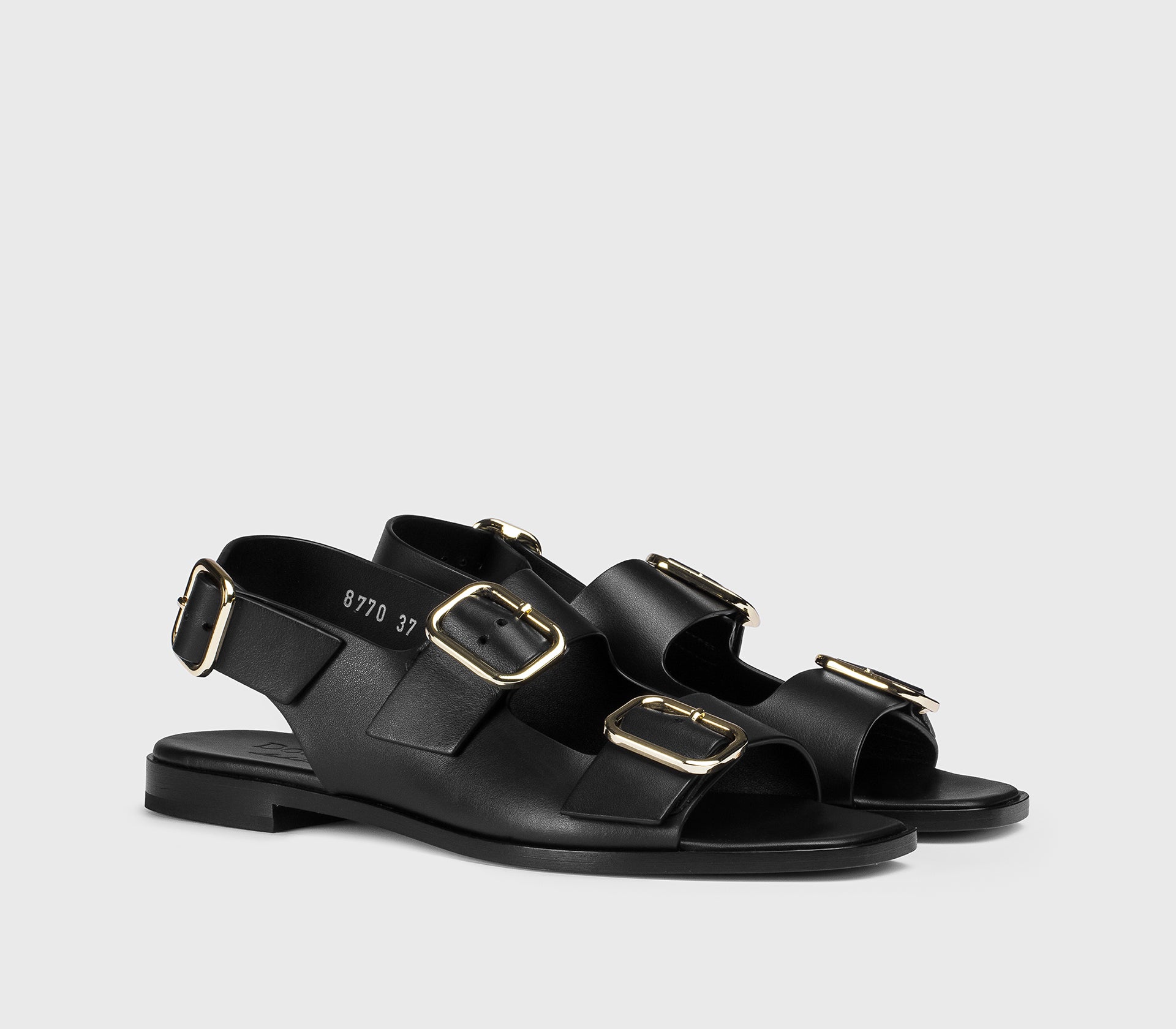 Сандалии из черной кожи с пряжками