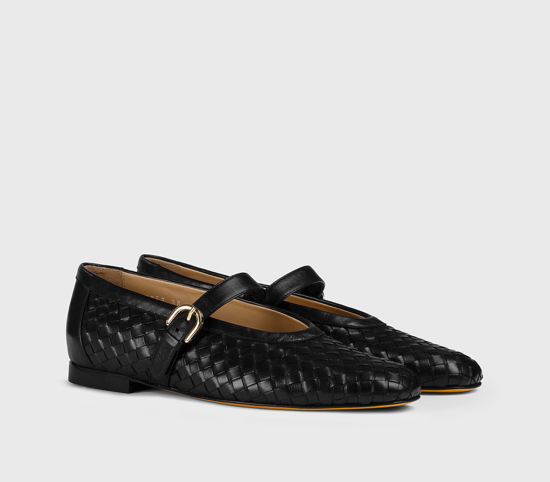 Black leather ballet flat with strap