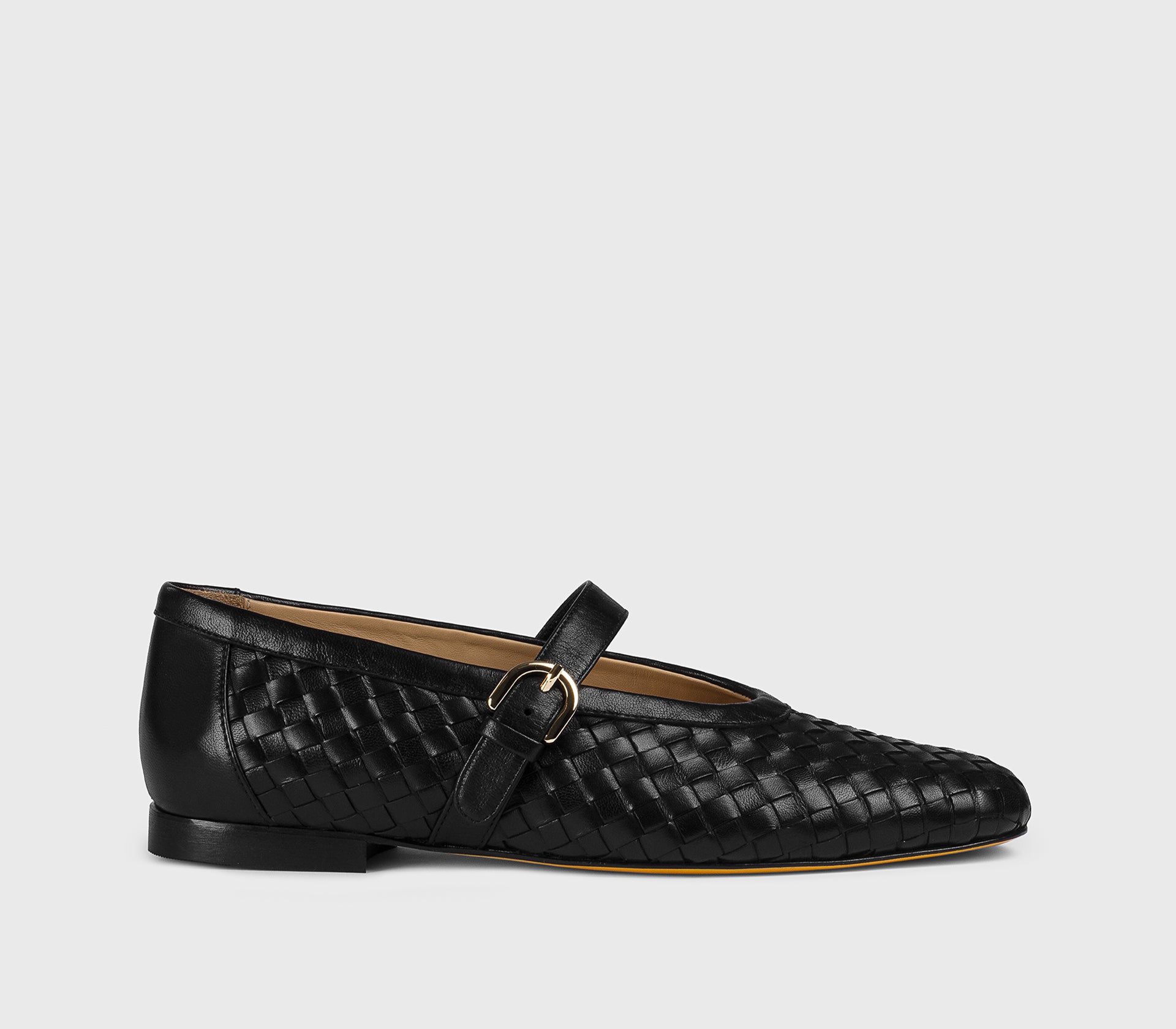 Black leather ballet flat with strap