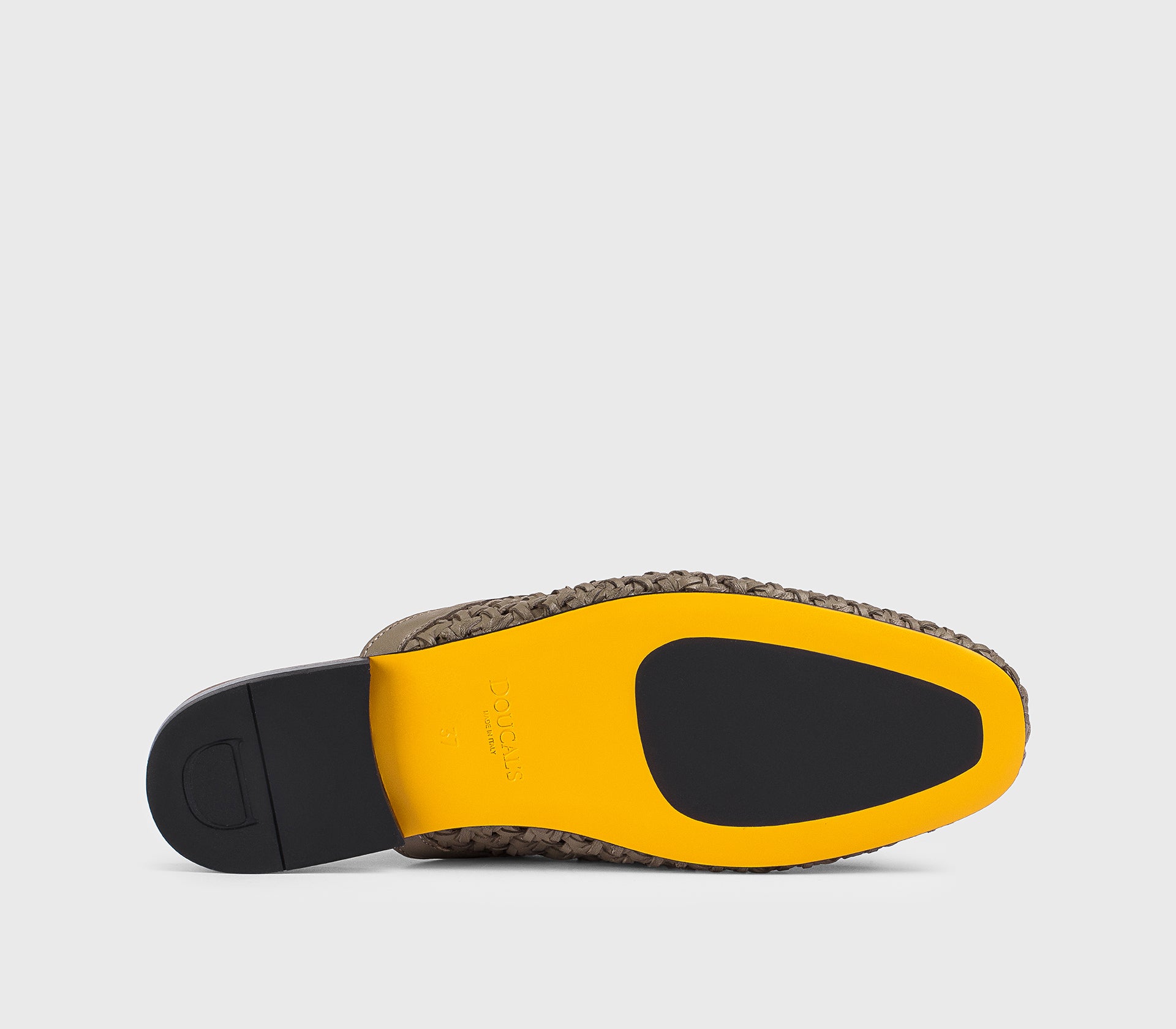 Mud-colored leather openwork mule with metal accessory