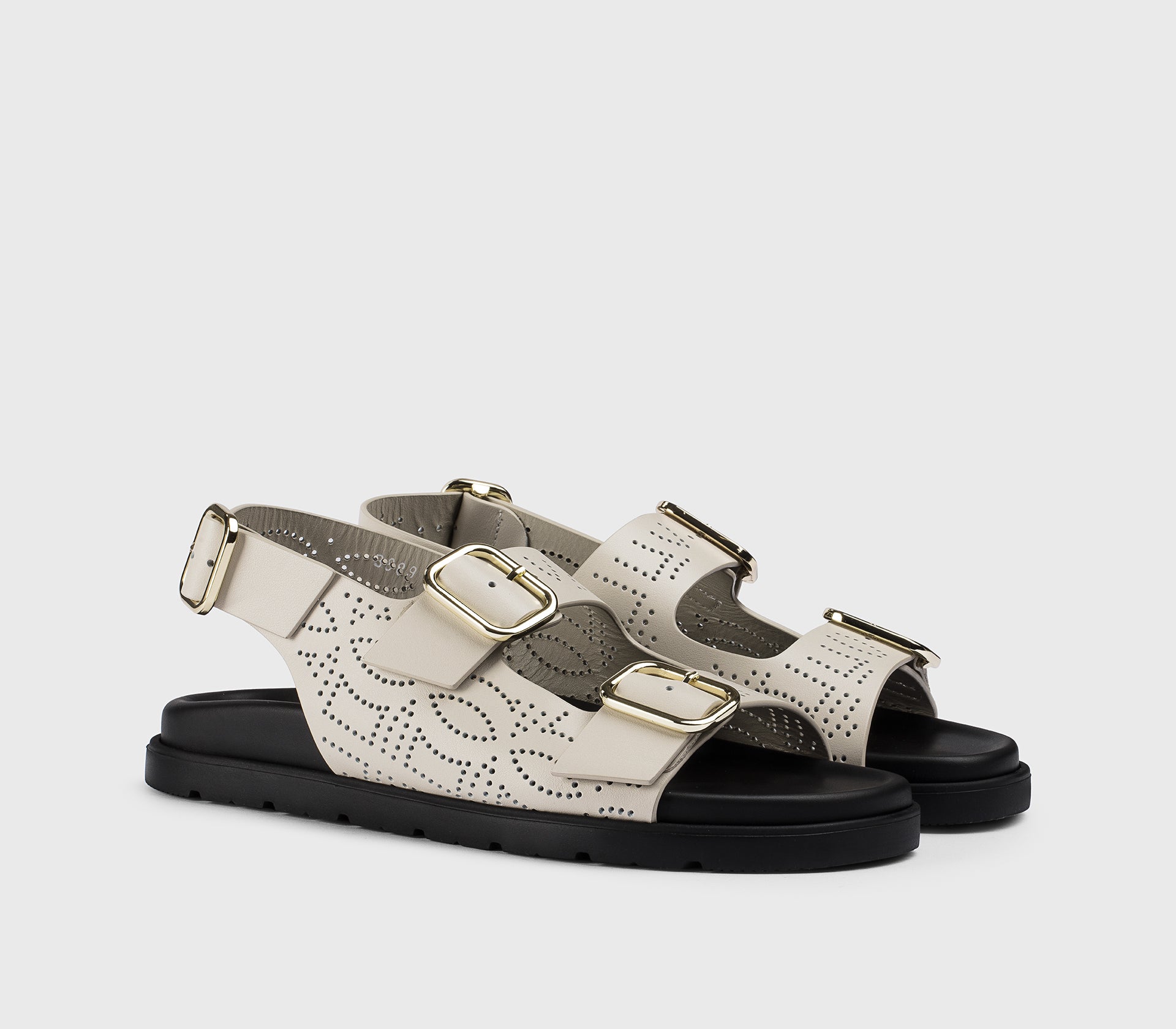 DD8889MATIUF073NW13 - Sandalo con fibbie in pelle traforata bianco "gesso"