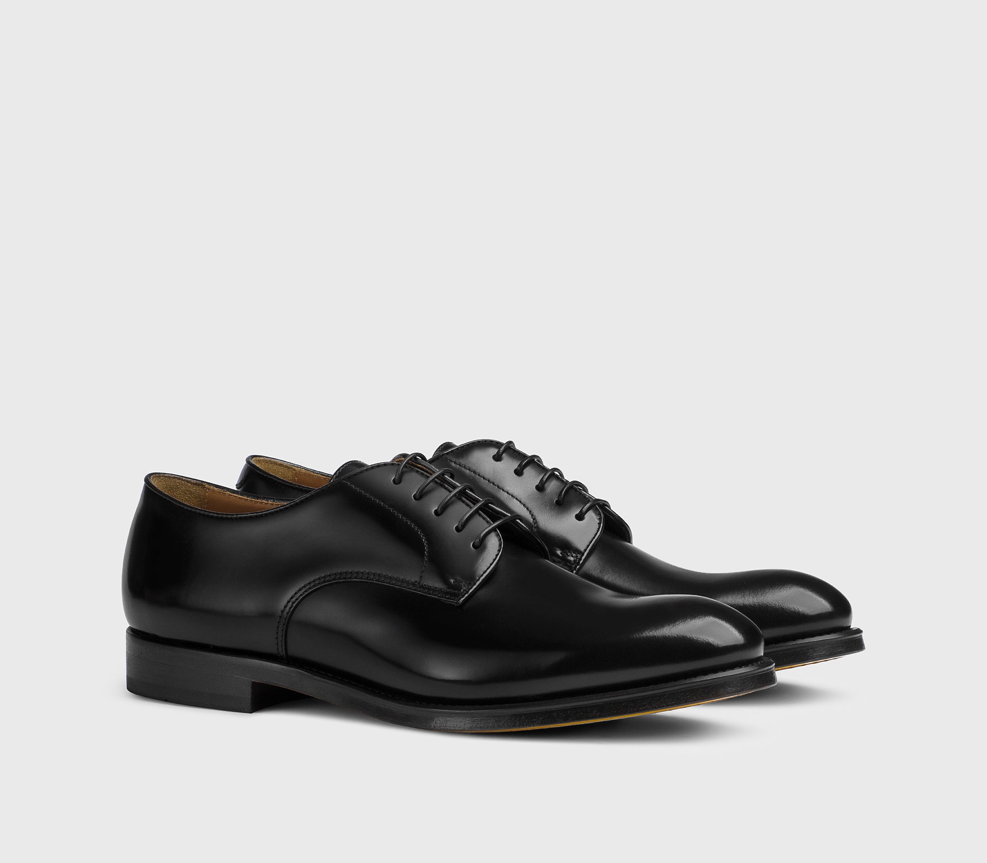 Black leather lace-up.