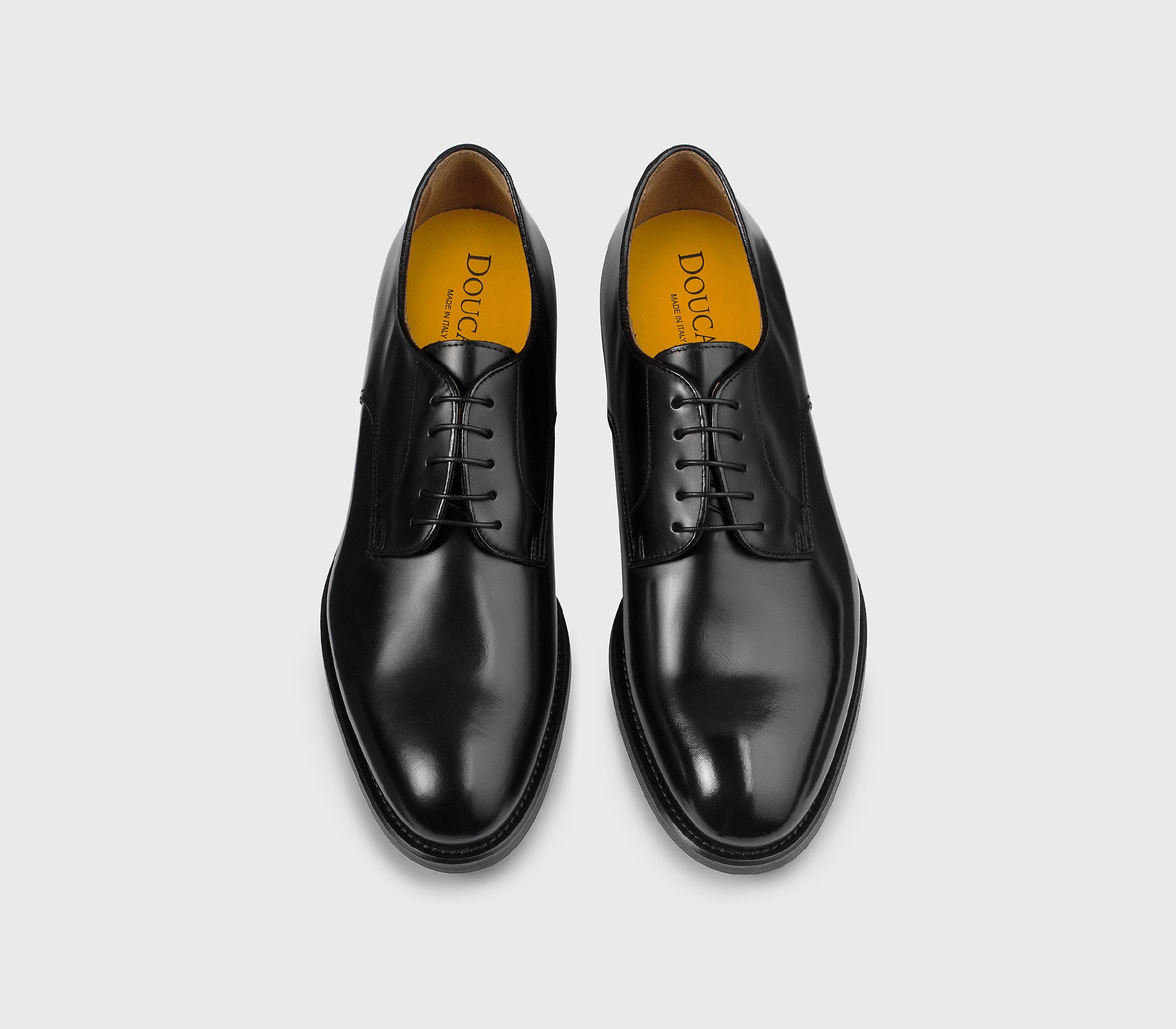 Black leather lace-up.
