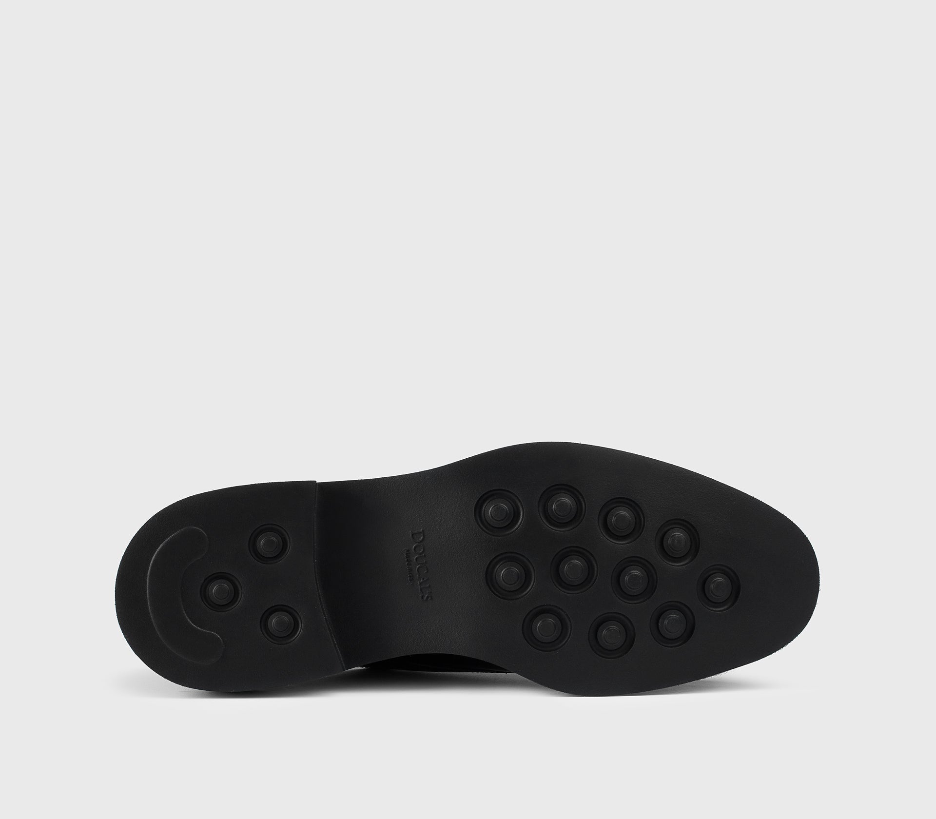 Black leather double-buckle shoe.