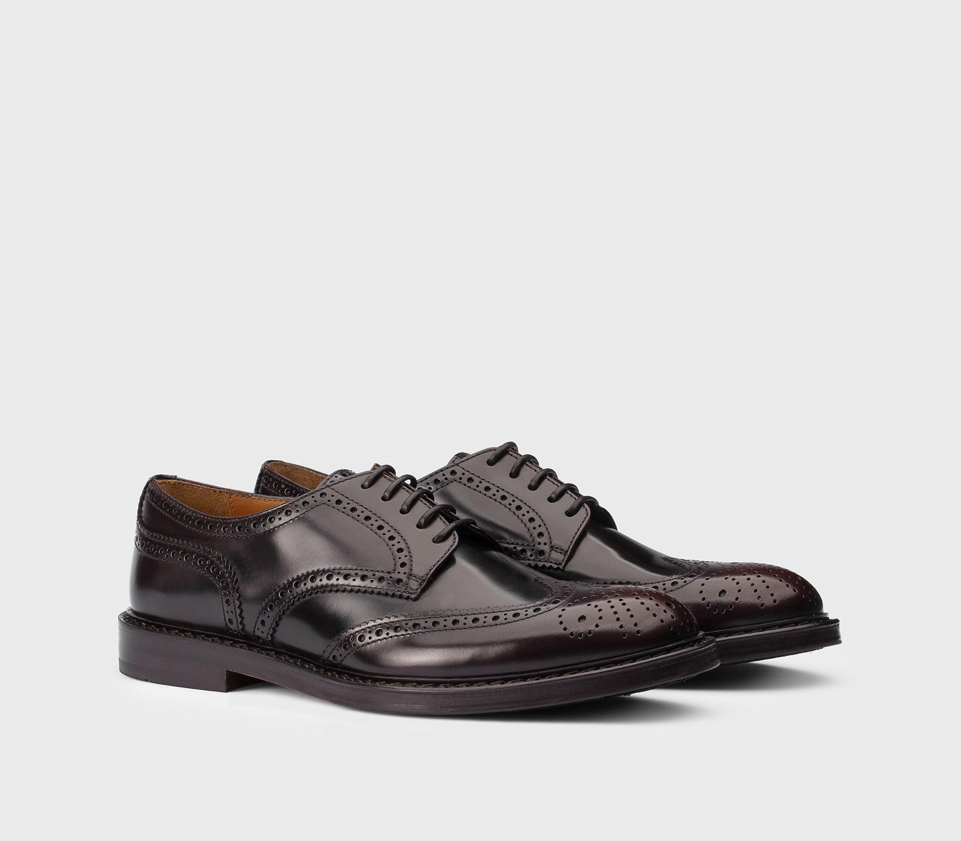 Brown leather dovetail lace-up.