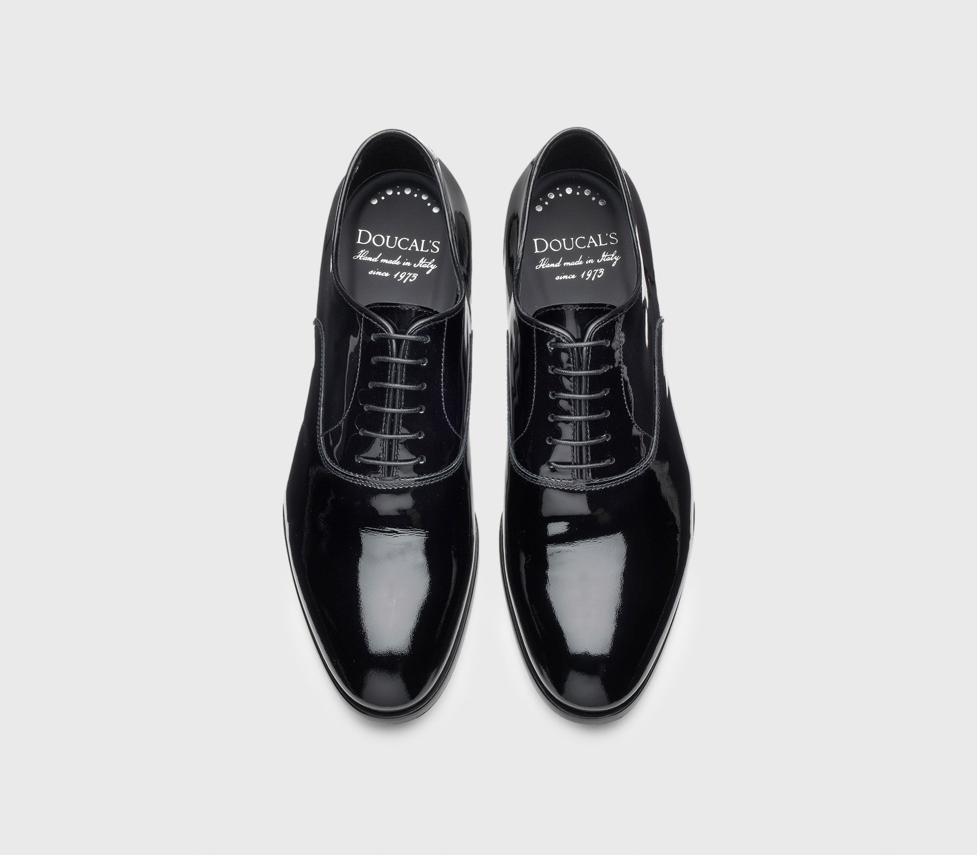 Black patent leather lace-ups