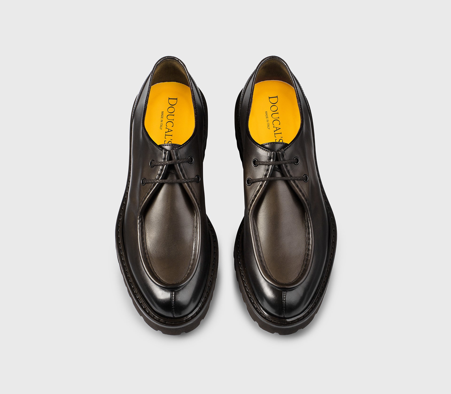 Dark brown two-hole leather lace-up.