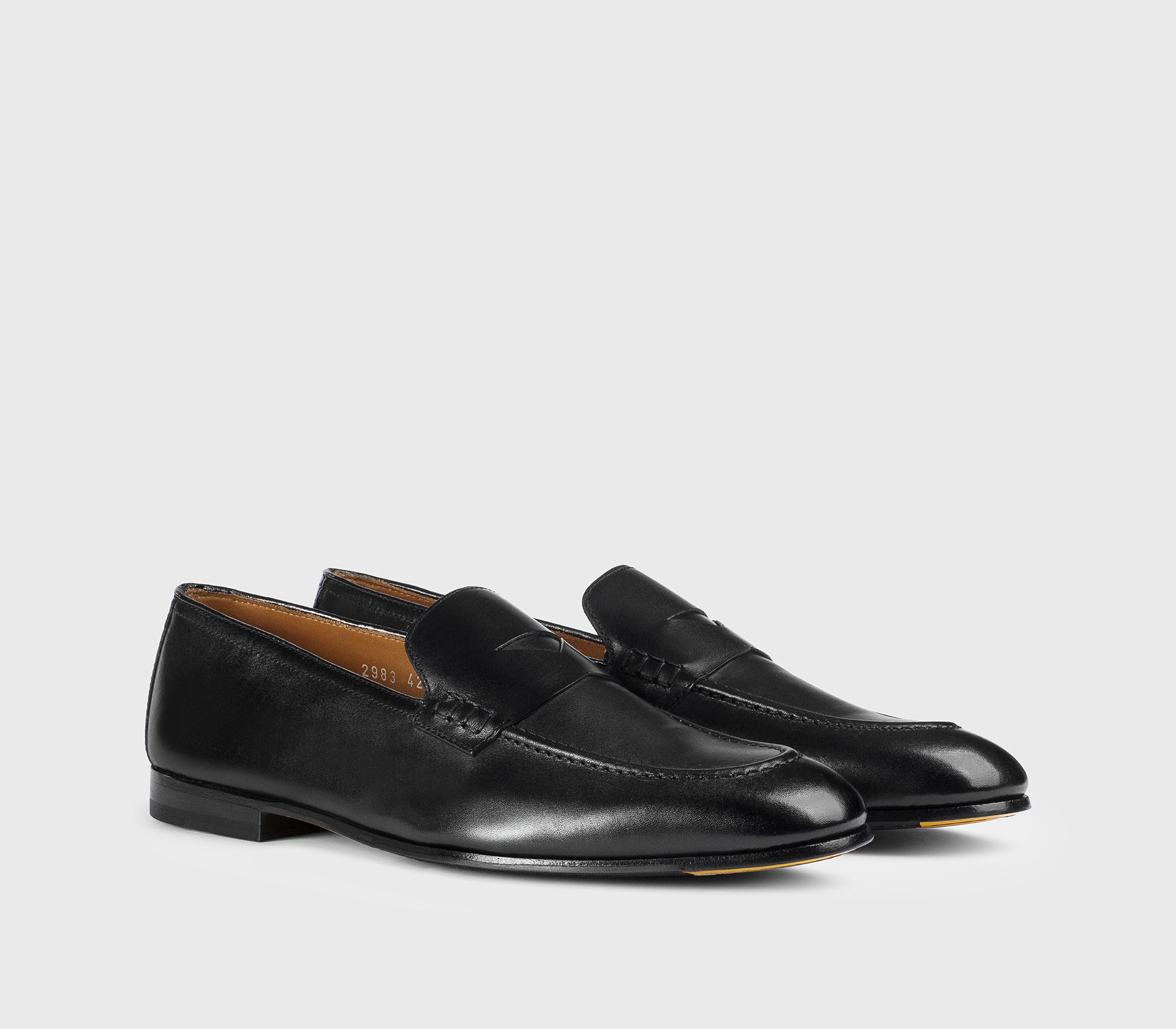 Black leather loafer.