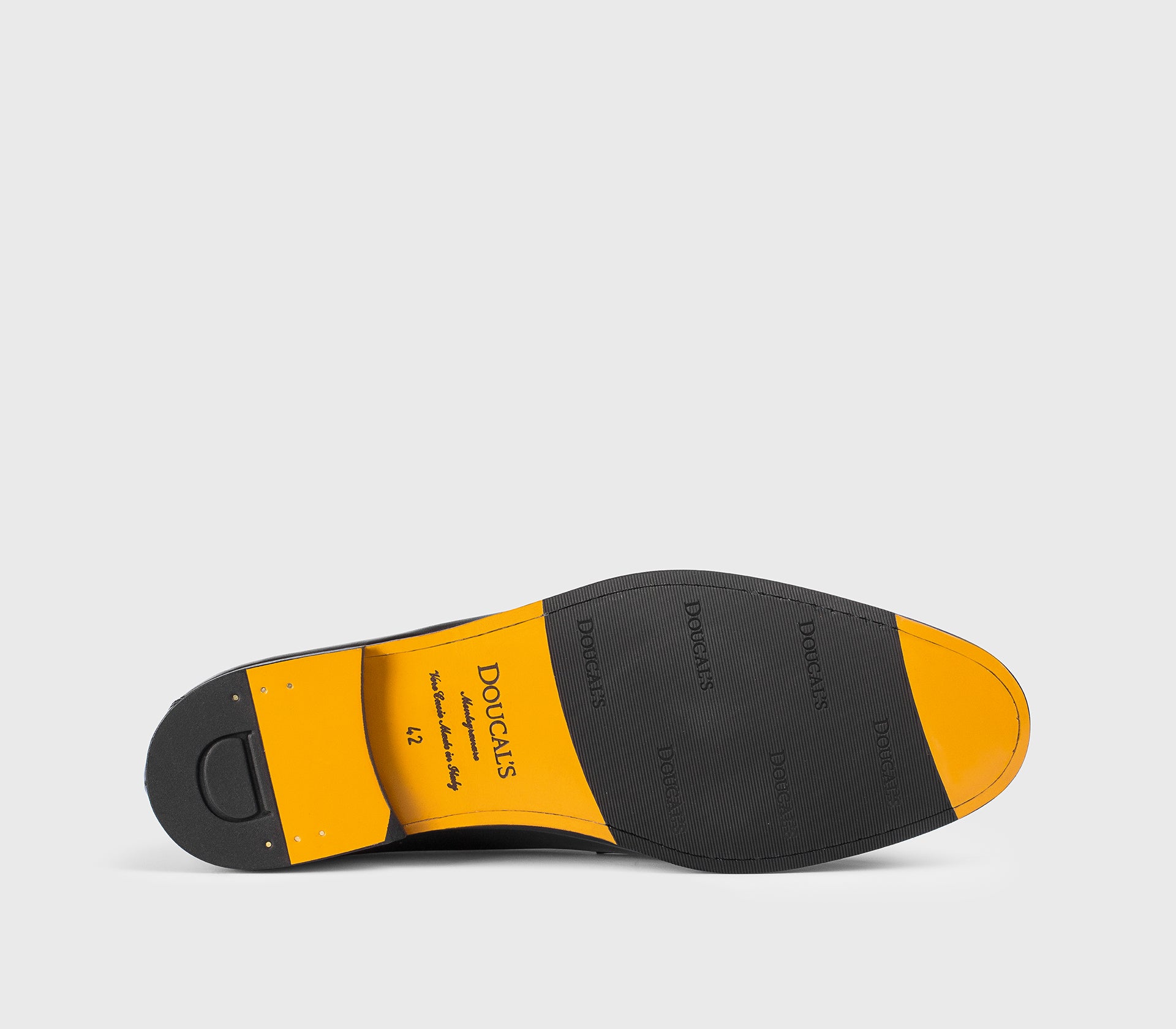 Black leather loafer.