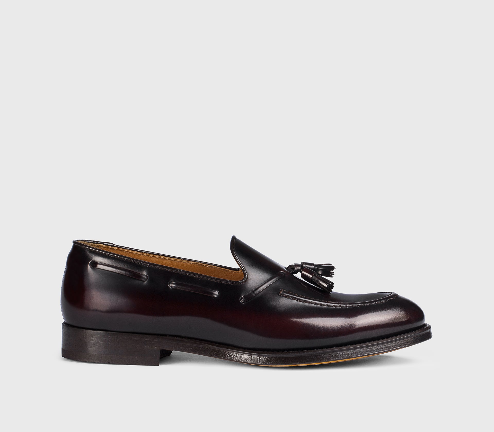 Mocassino con nappine da uomo in pelle | burgundy - Doucal's