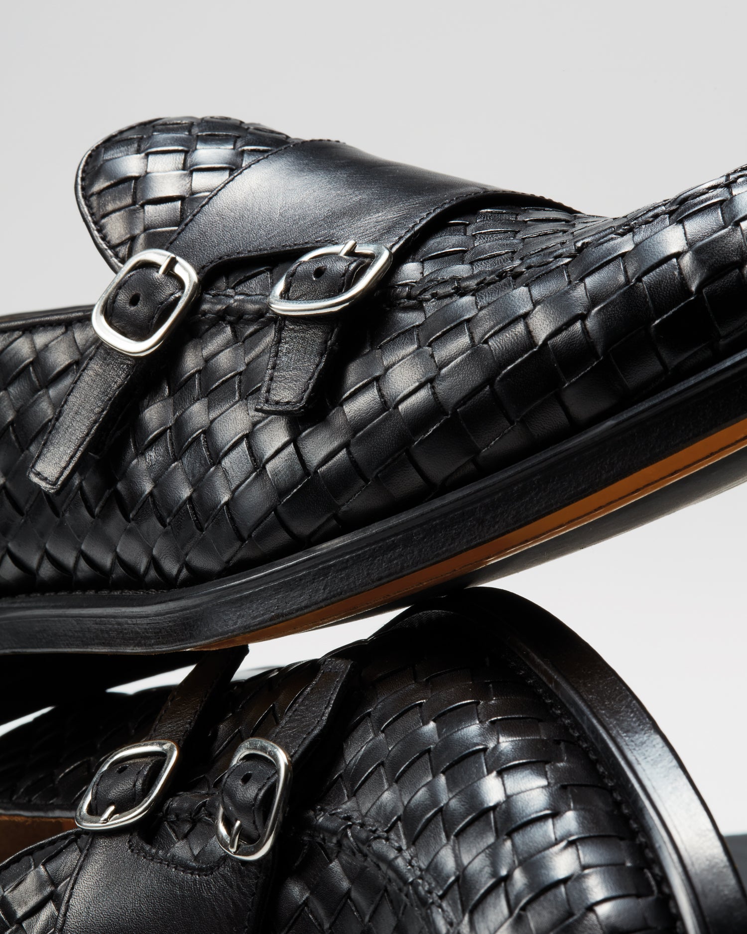 Mocassin à double boucle en cuir tressé noir