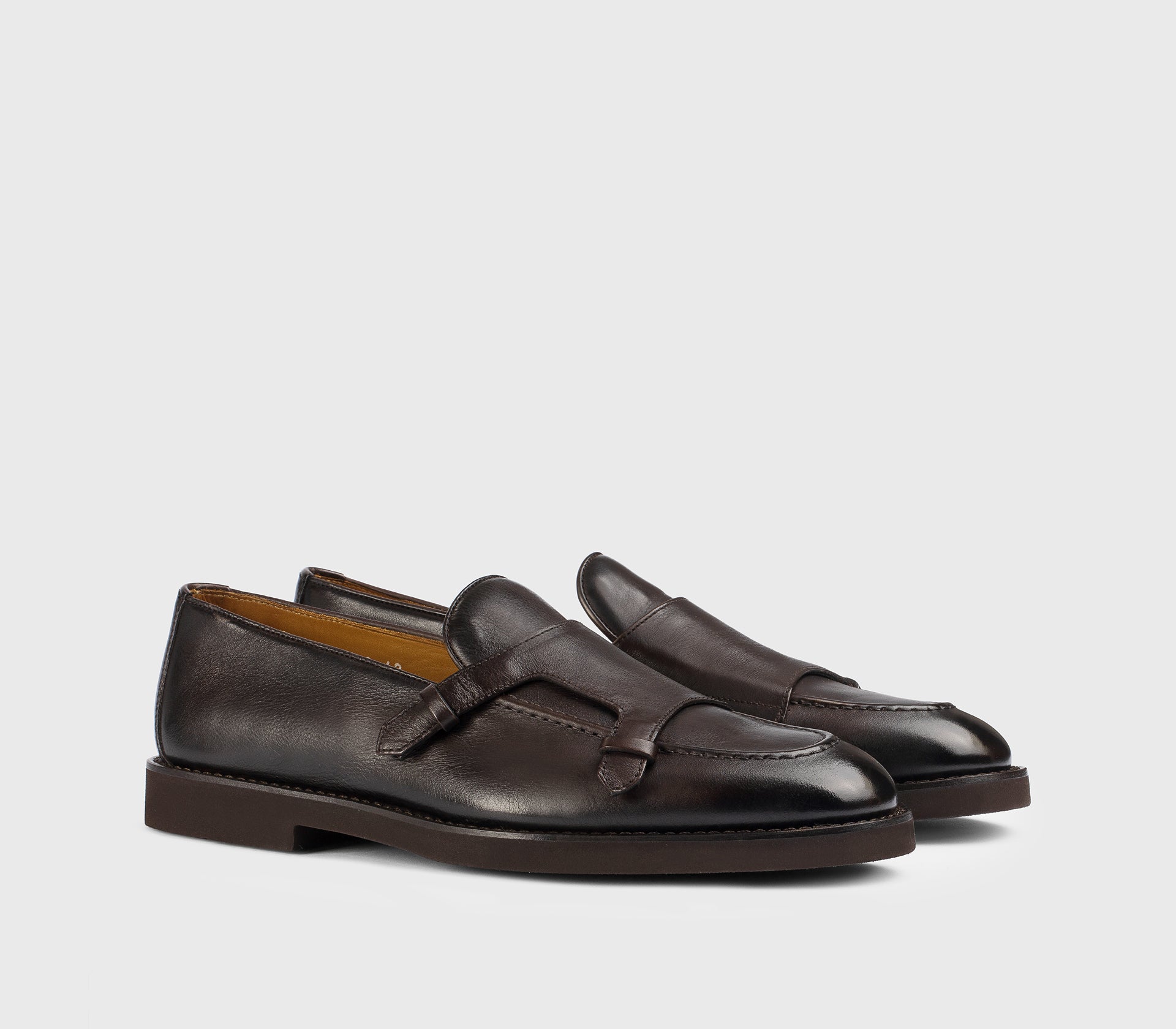 Dark brown leather loafer with “loop” detail