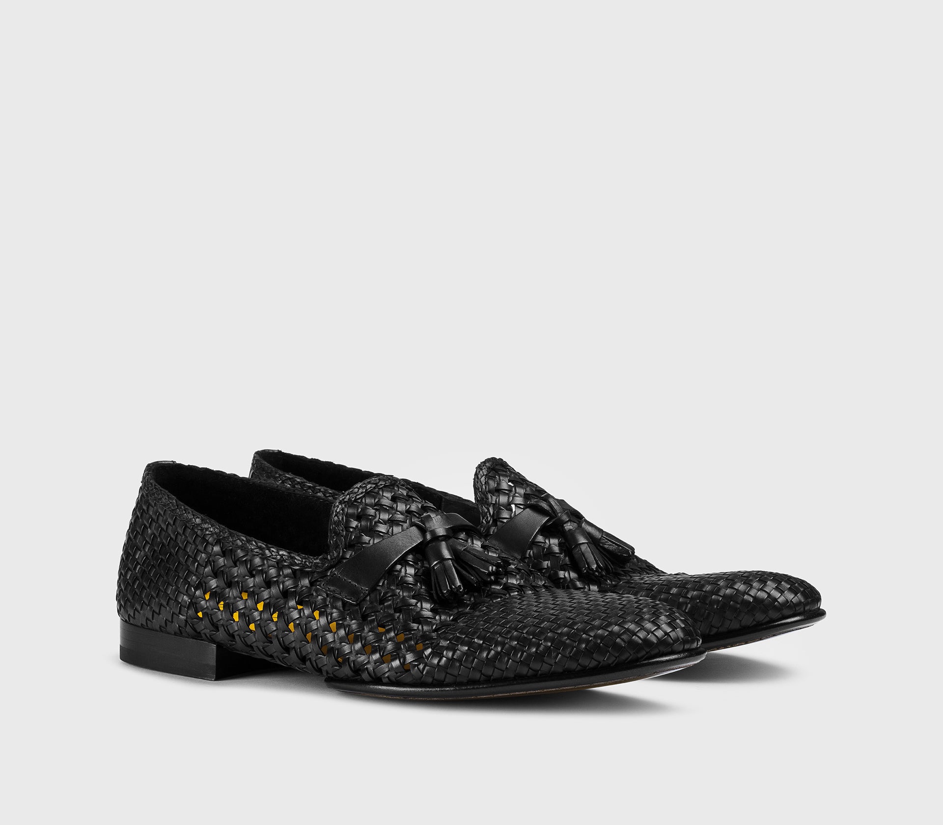 Black leather openwork loafer with tassels