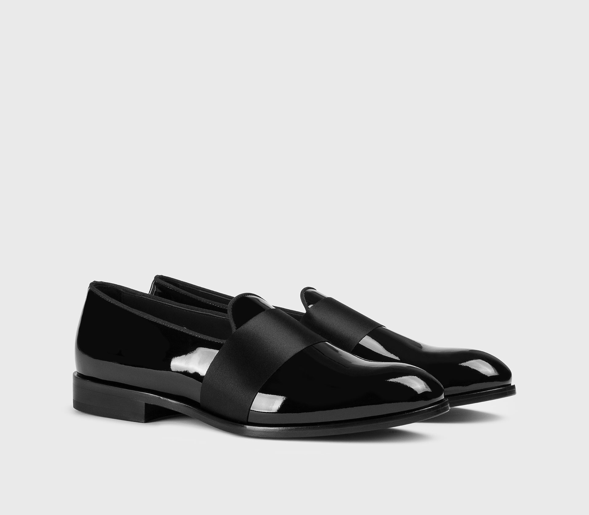 Slipper loafer with black patent leather band