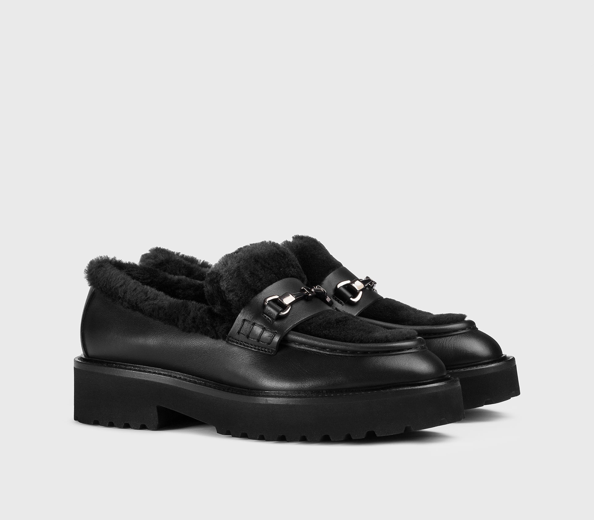 Leather loafer with black fur detail