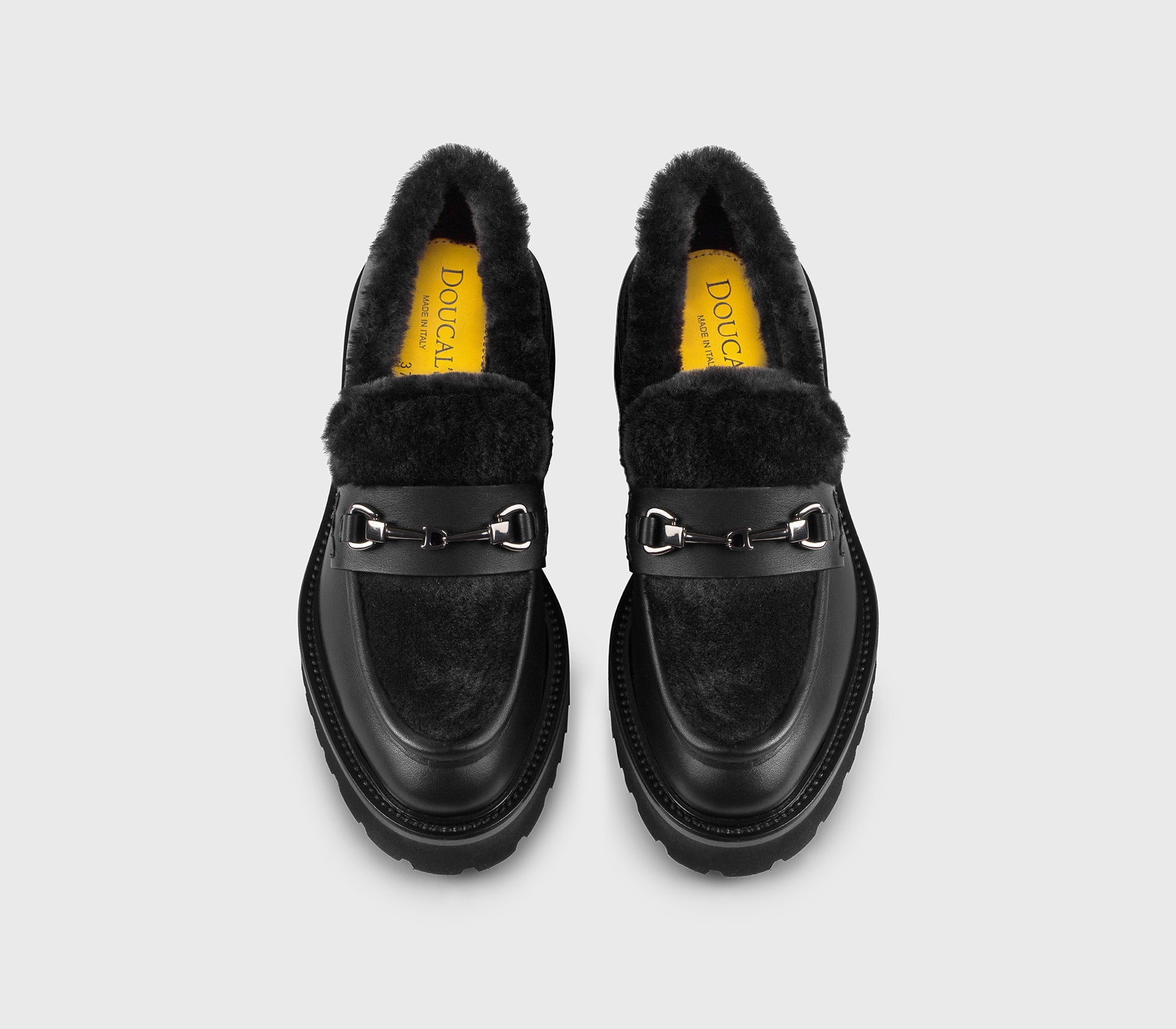 Leather loafer with black fur detail
