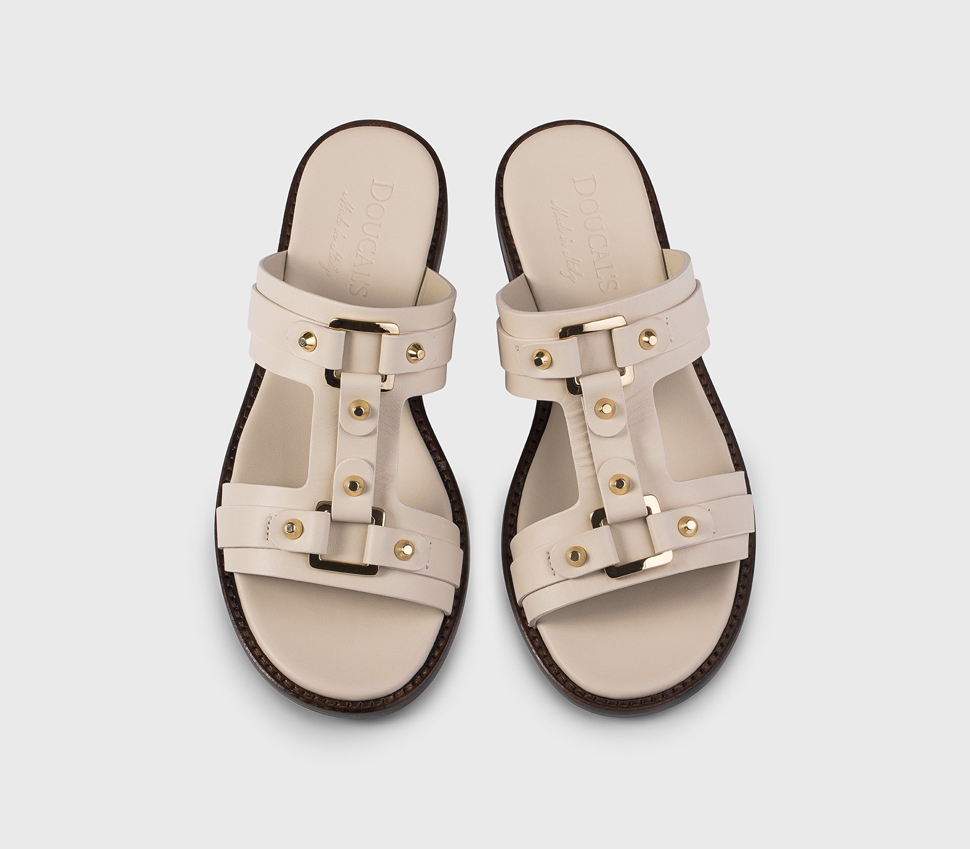 Sandal in white leather with studs