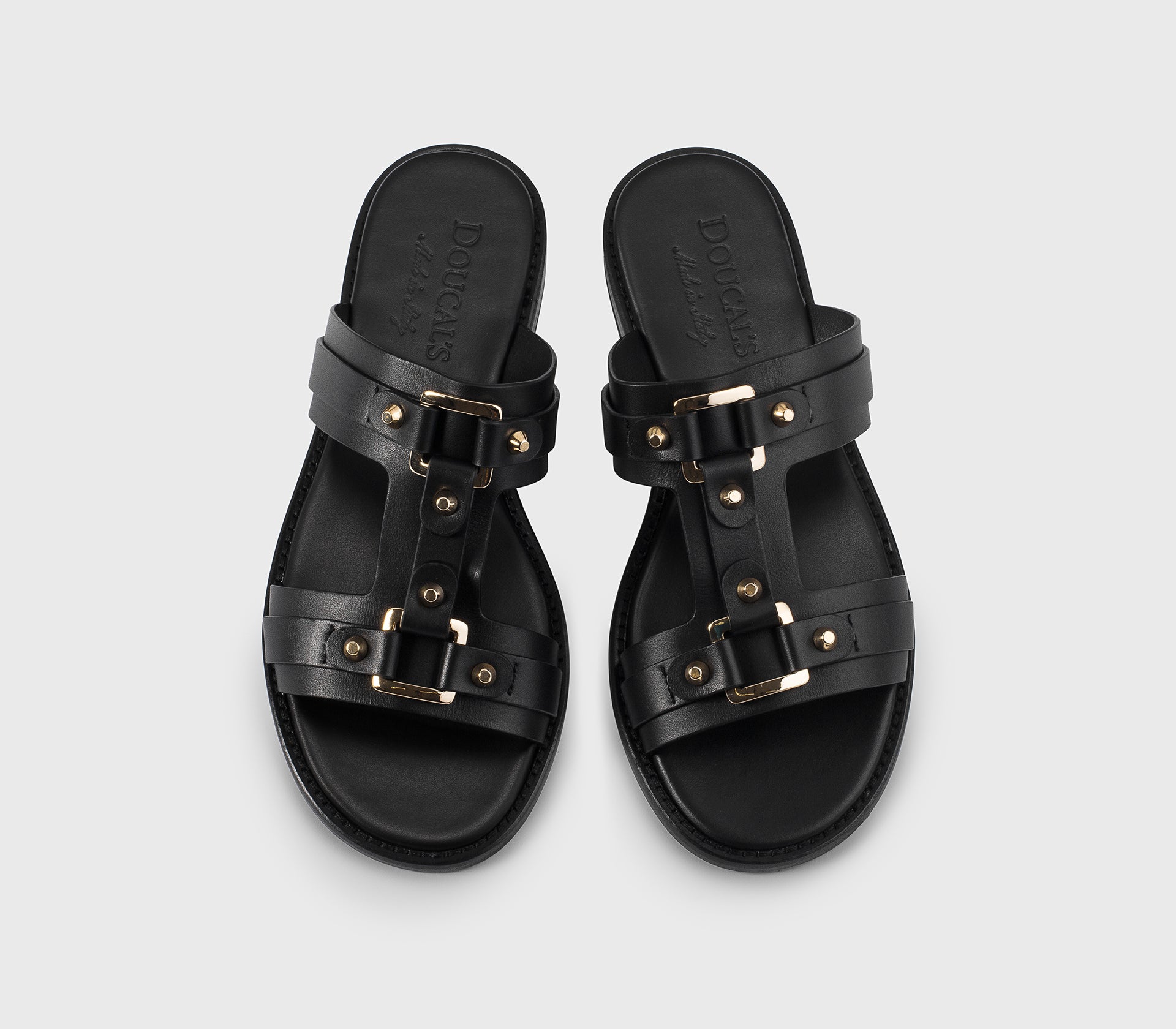 Sandal in black leather with studs