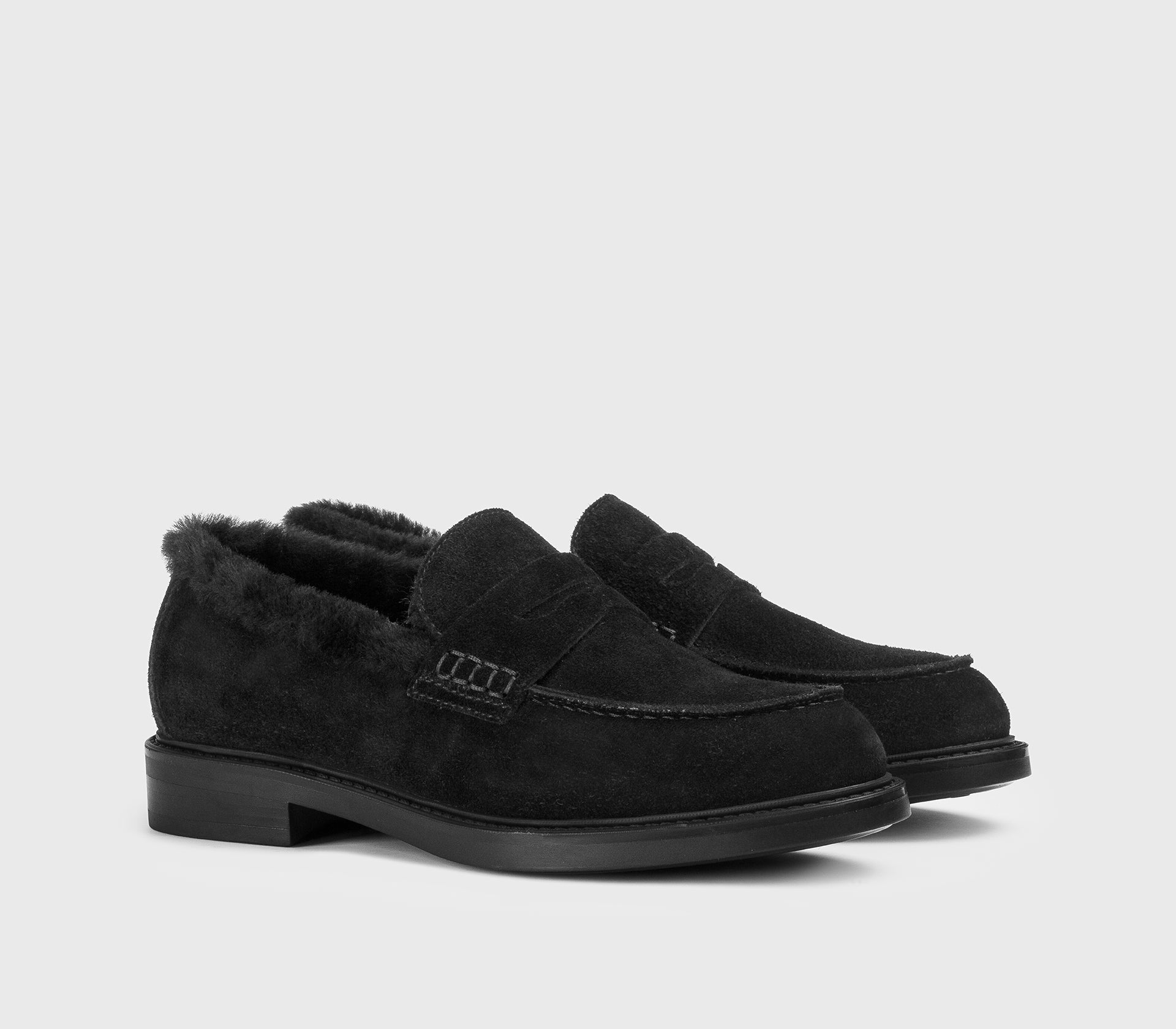 Black suede loafer with fur detail