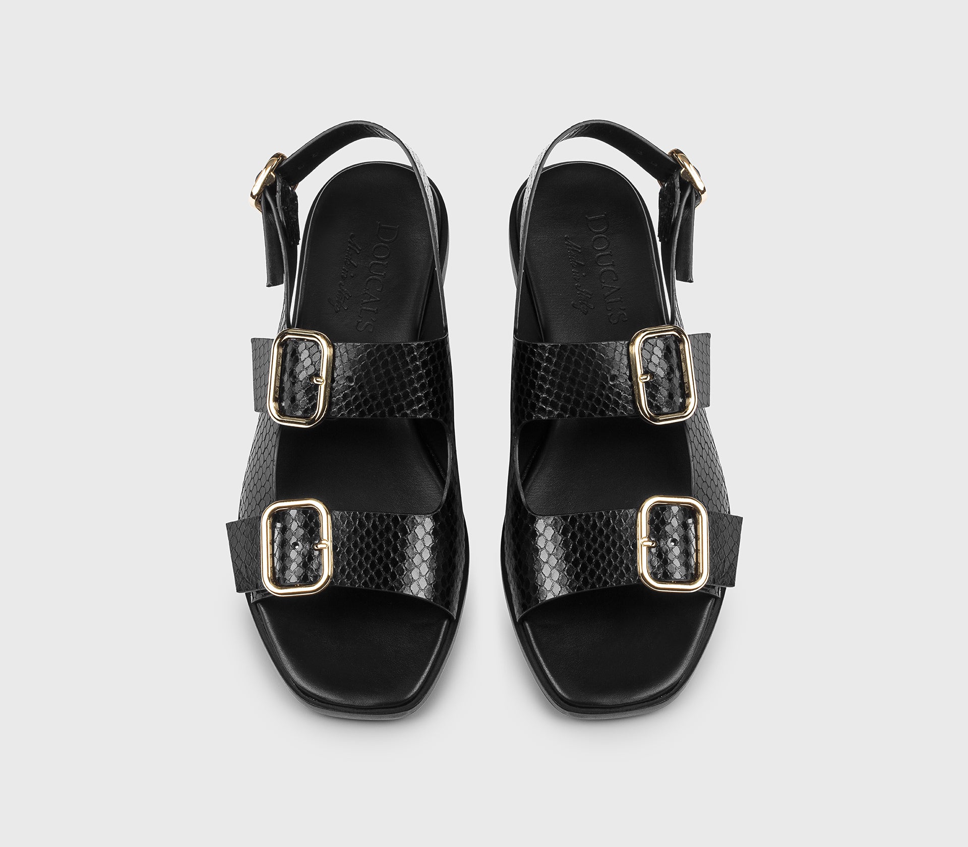Sandale aus schwarzem Leder mit Pythondruck