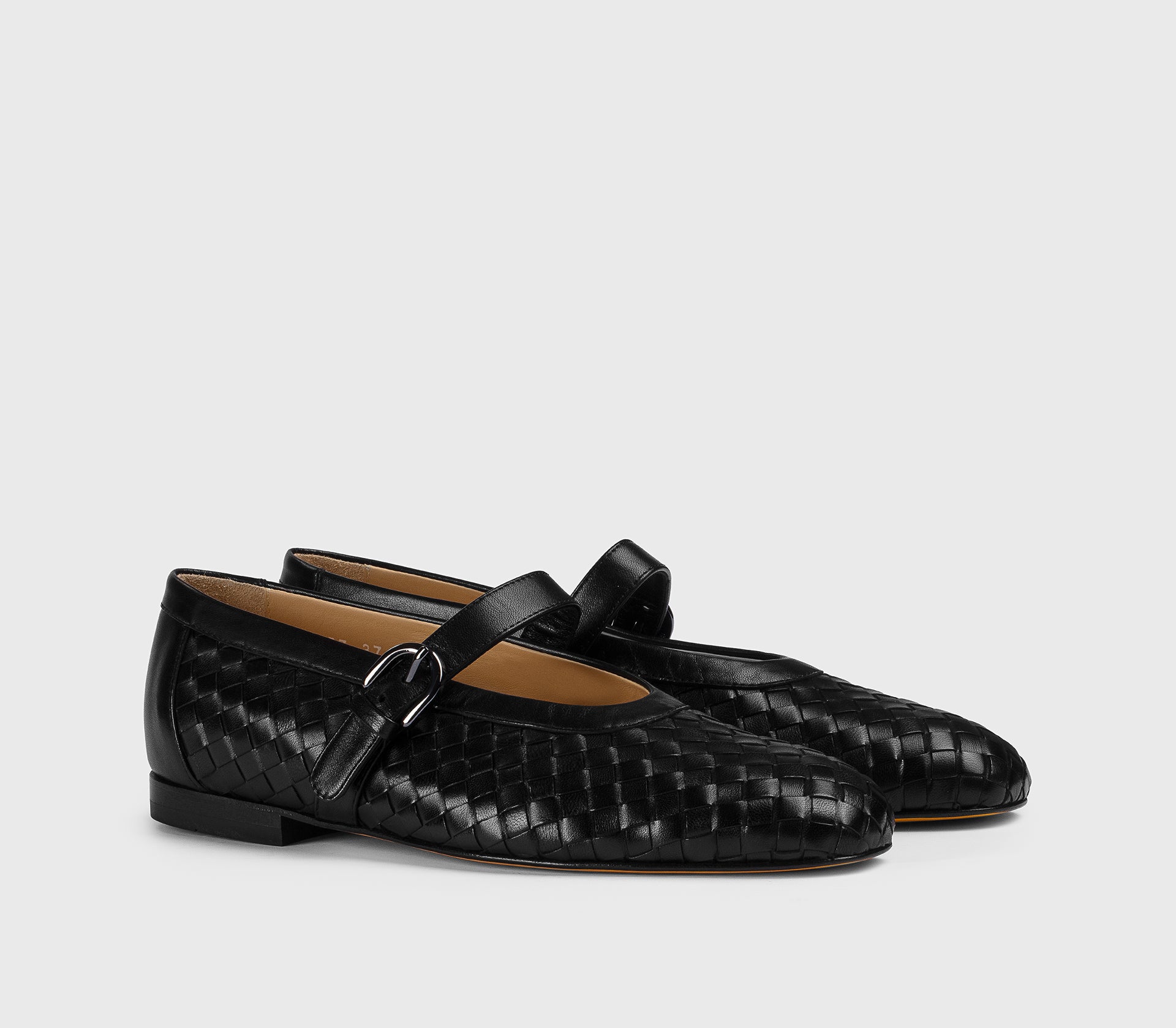 Black leather ballet flat with strap