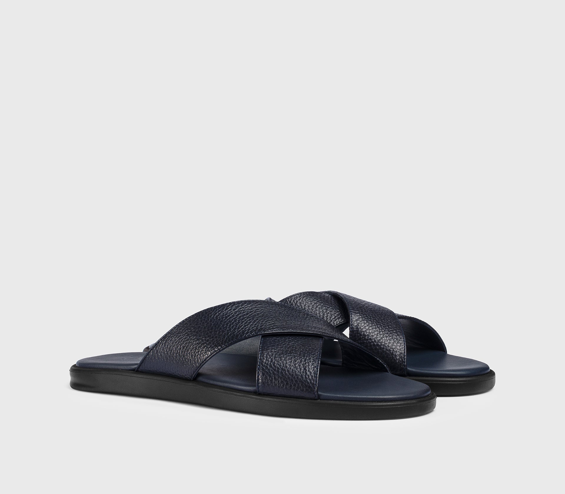 Blue leather sandal with two crossed straps