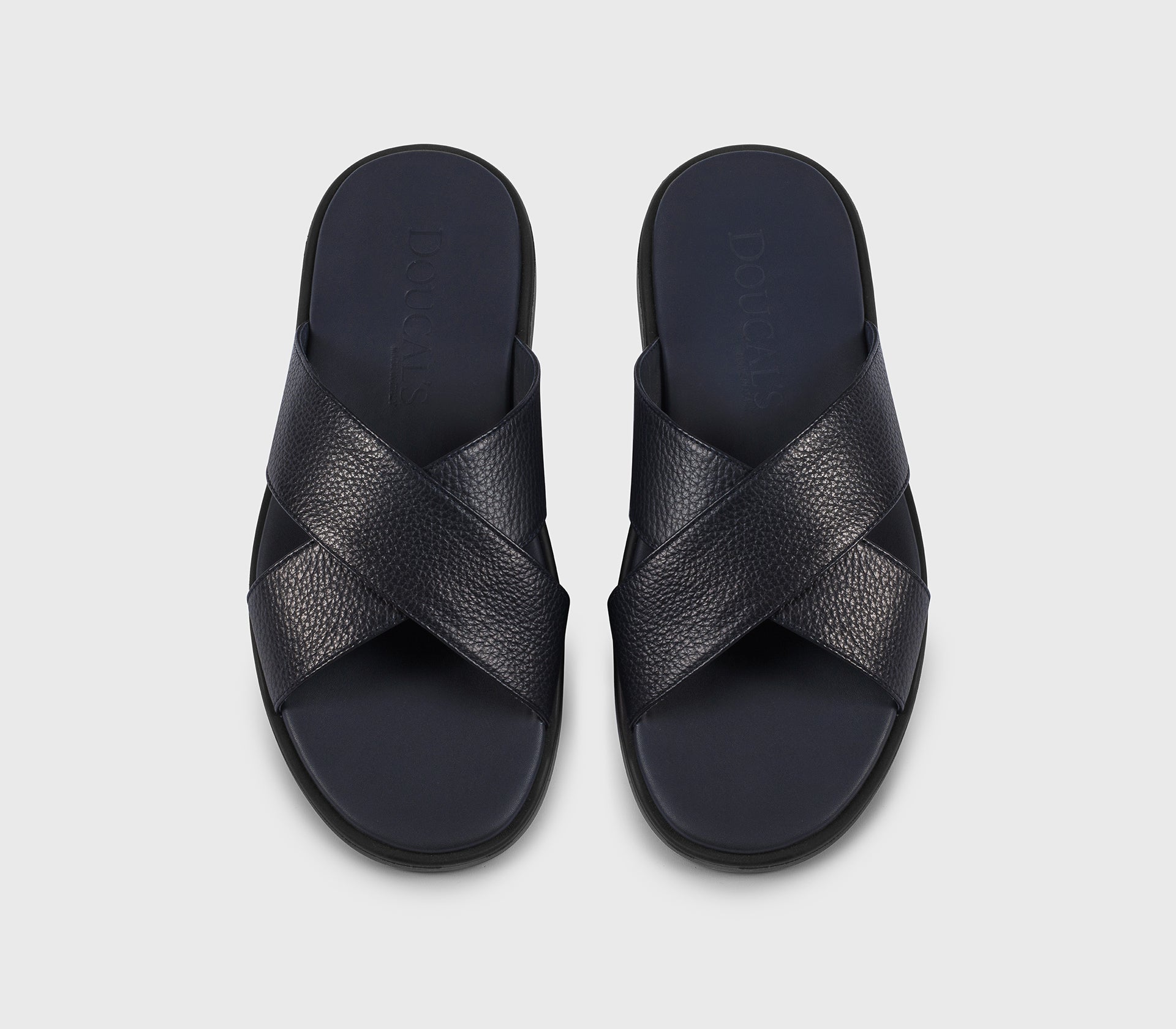 Blue leather sandal with two crossed straps