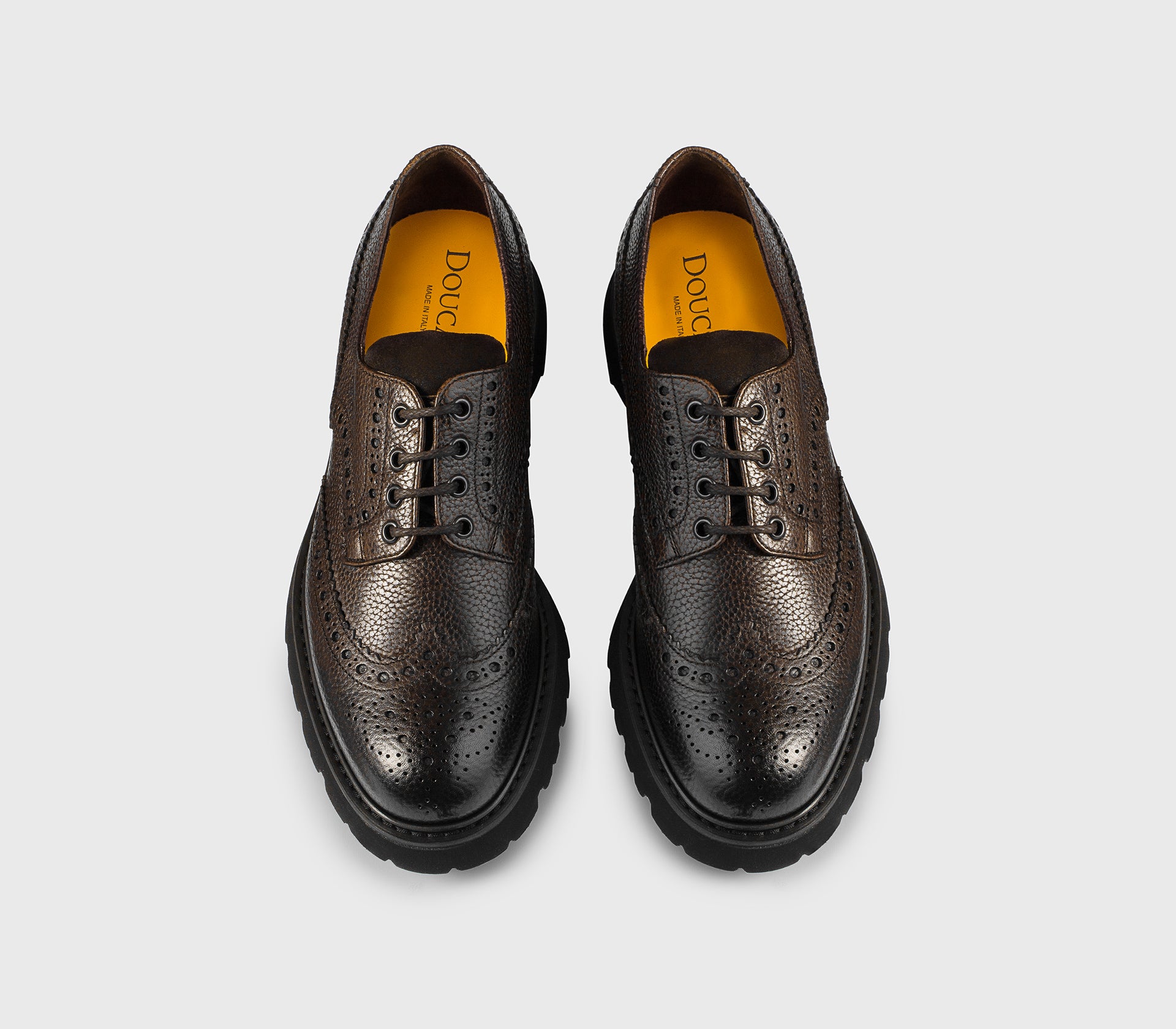 Brown leather dovetail lace-up.