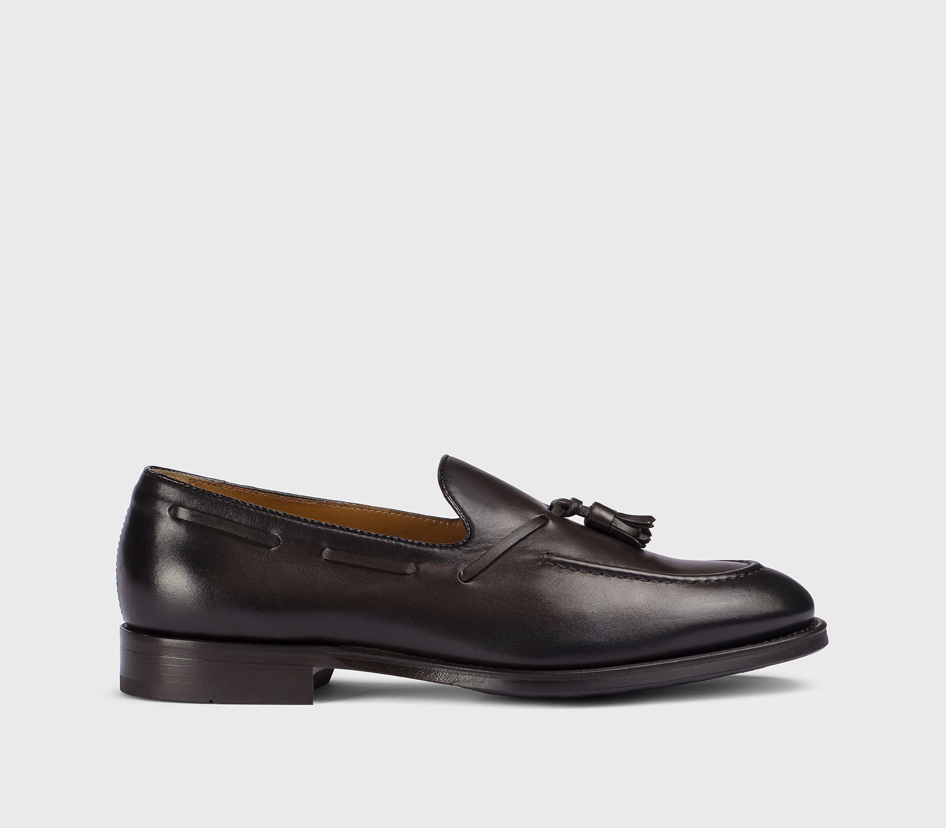 Dark brown leather loafer with tassels