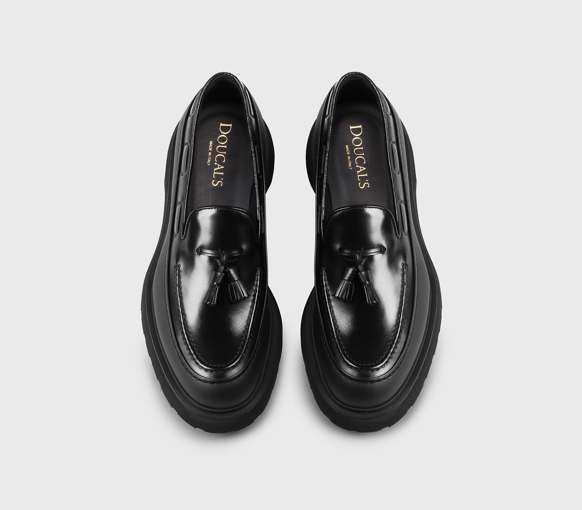 DU3355STONPF555NN00 - Mocassino con nappine in pelle e tessuto gommato nero