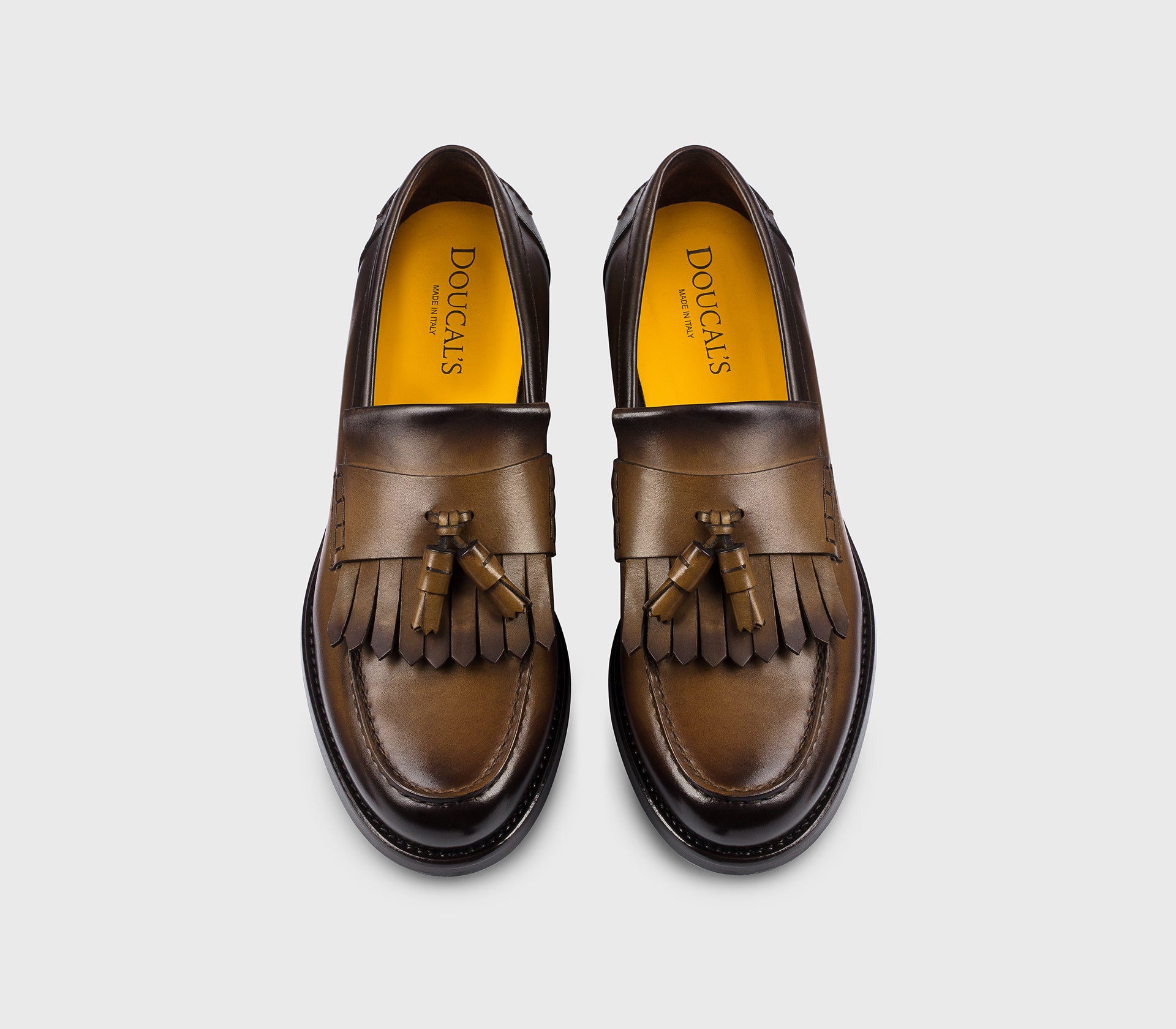 “Wood” brown leather loafer with tassels and fringe