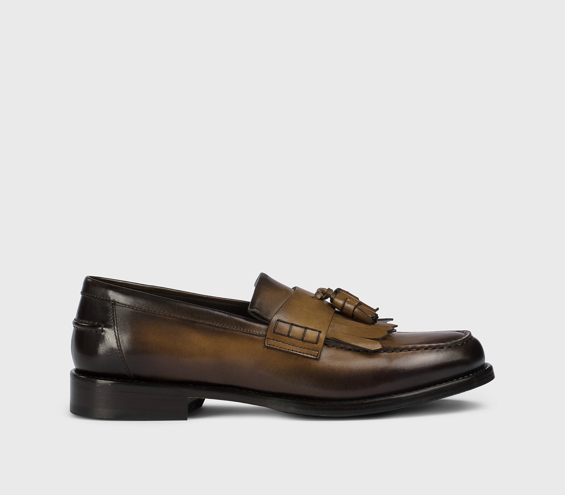 “Wood” brown leather loafer with tassels and fringe