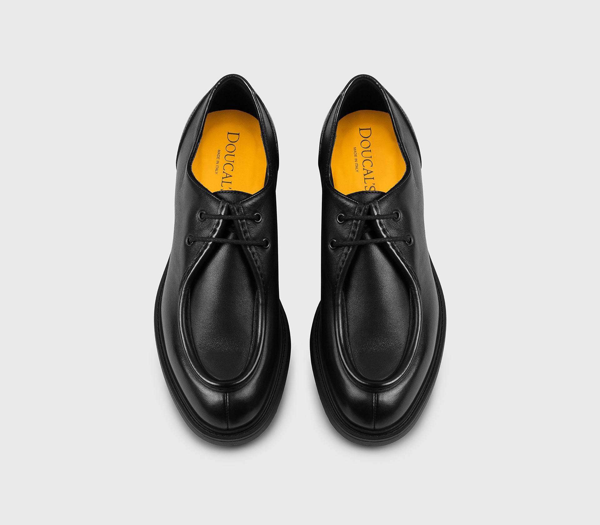 Black two-hole leather lace-up