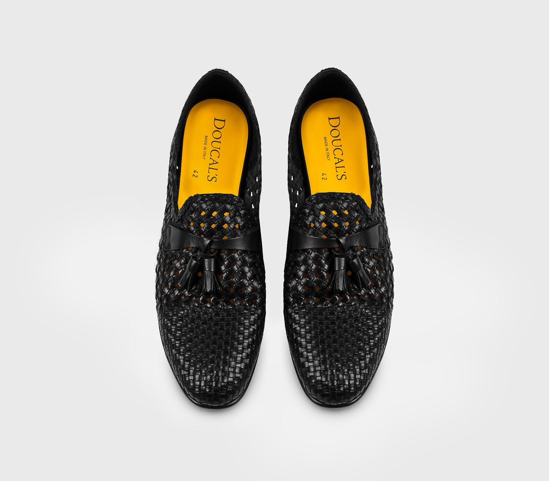 Black leather openwork loafer with tassels