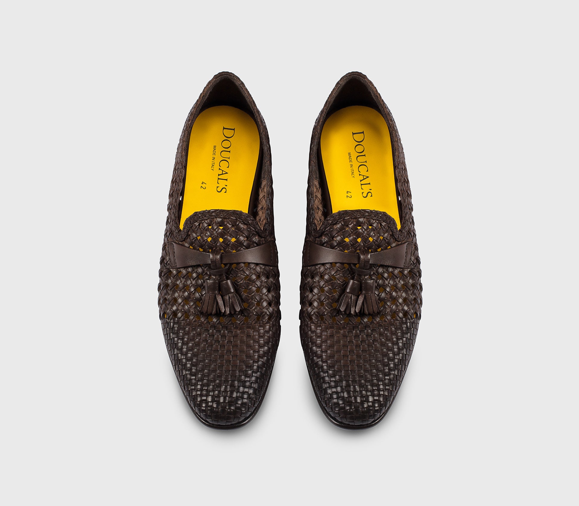 DU3522TAORUZ276TM00 - Mocassino in pelle traforata con nappine testa di moro