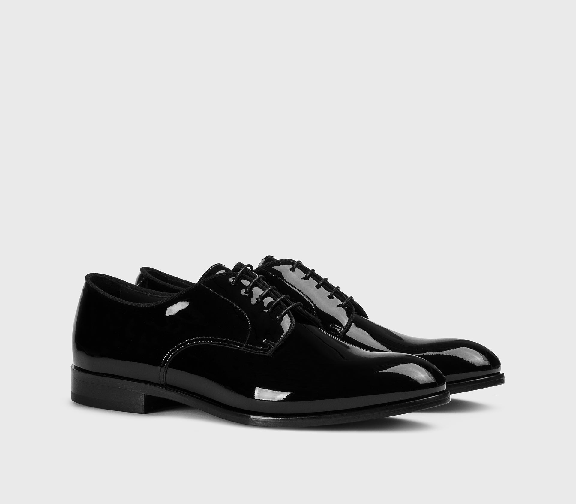 Black patent leather lace-up