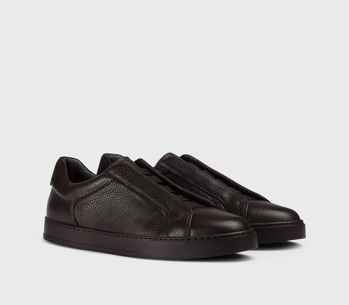 “Ebony” brown tumbled leather sneaker with suede detail