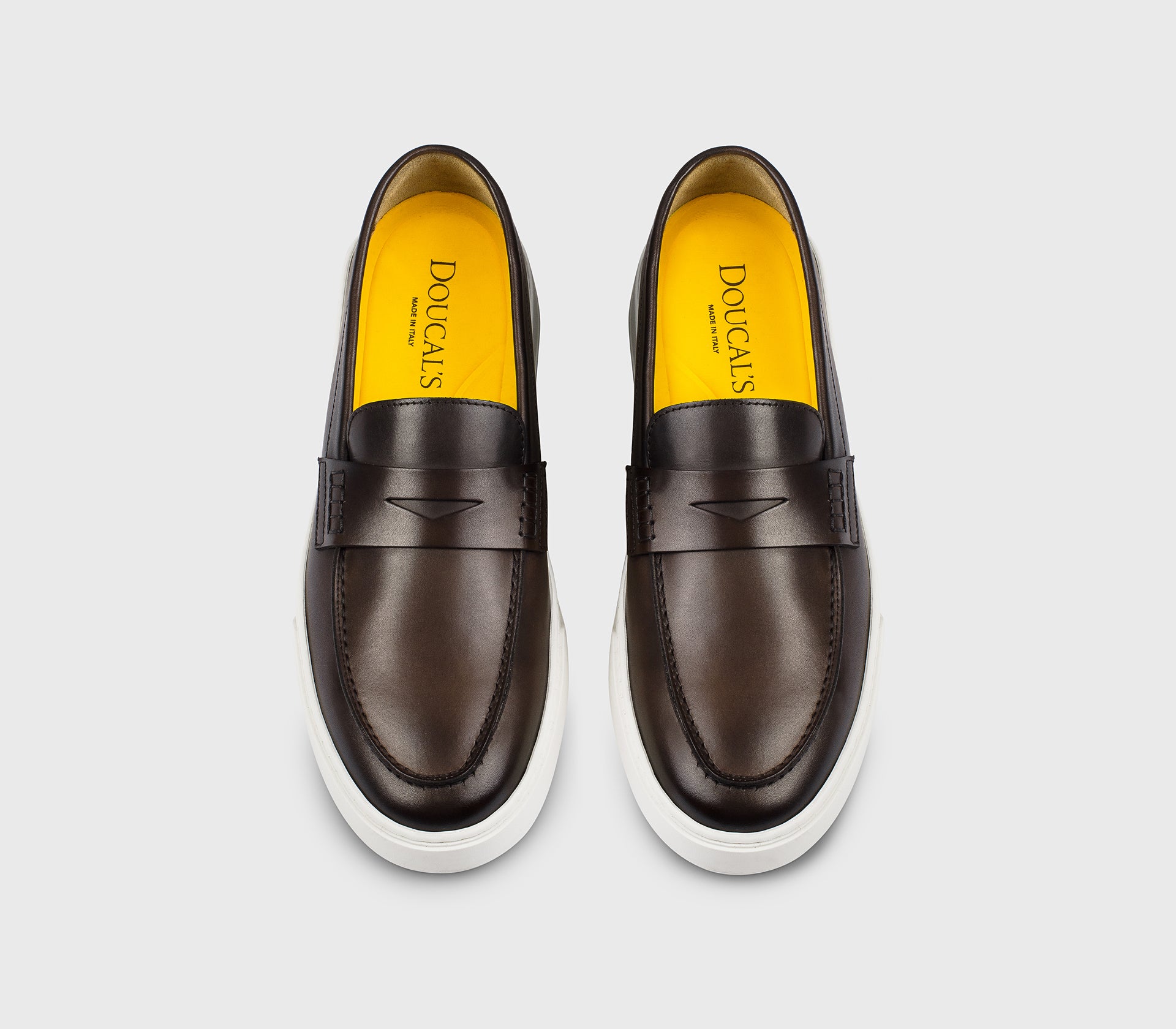 Dark brown leather slip-on loafer with vamp