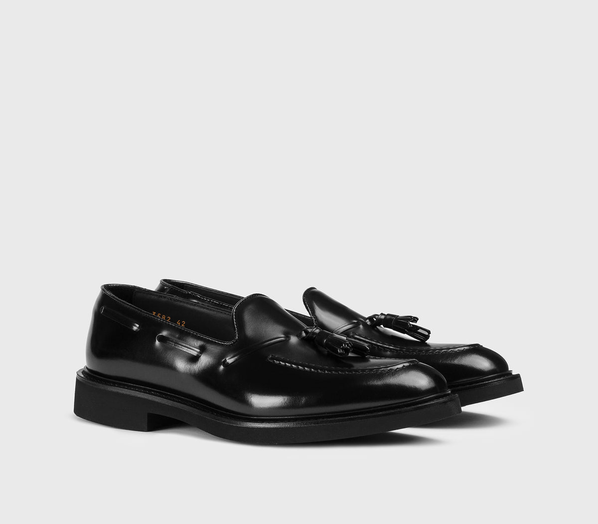 DU3582GENOUF007NN00 - Mocassino con nappine in pelle nero